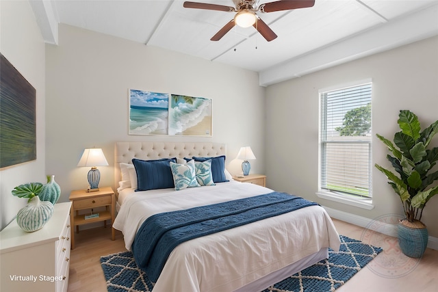 610 S Shady Ln, Shoreacres, TX 77571 - bedroom featuring light wood-style flooring, a ceiling fan, and baseboards