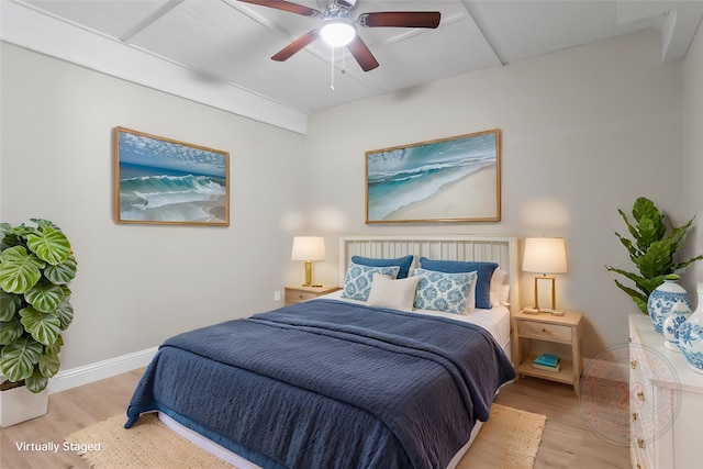 610 S Shady Ln, Shoreacres, TX 77571 - bedroom with light wood finished floors, baseboards, and a ceiling fan