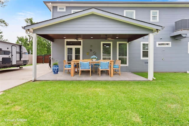 610 S Shady Ln, Shoreacres, TX 77571 - back of house with a ceiling fan and a patio