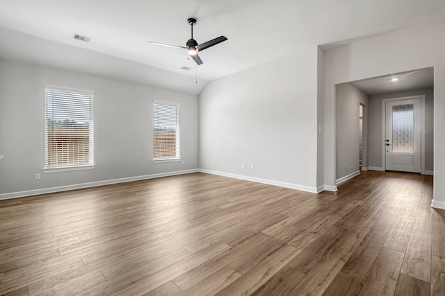 15683 Honey Cove Dr, Conroe, TX 77303 - unfurnished room featuring ceiling fan, wood finished floors, and baseboards