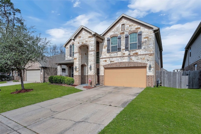 21275 Lily Springs Dr, Porter, TX 77365 - french country home featuring stone siding, an attached garage, driveway, and brick siding