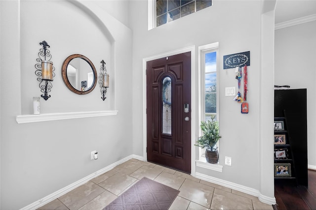 21275 Lily Springs Dr, Porter, TX 77365 - tiled entryway featuring baseboards and crown molding