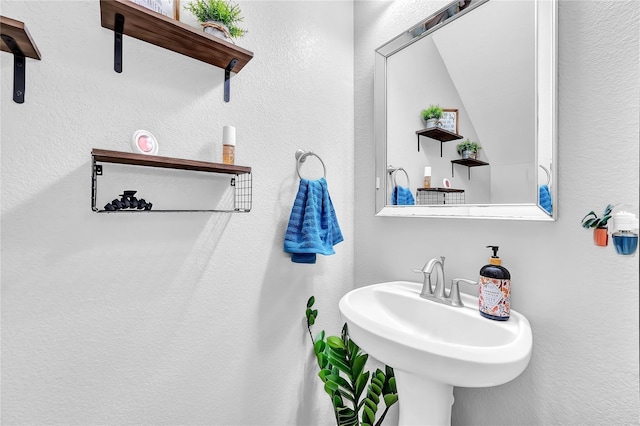 21275 Lily Springs Dr, Porter, TX 77365 - bathroom with a sink and a textured wall