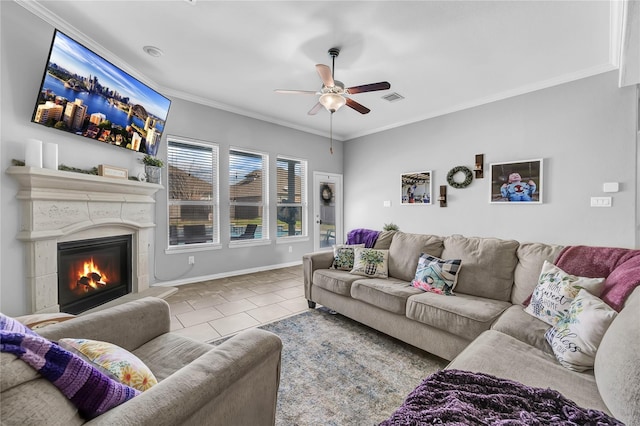 21275 Lily Springs Dr, Porter, TX 77365 - tiled living area featuring a ceiling fan, a glass covered fireplace, and ornamental molding
