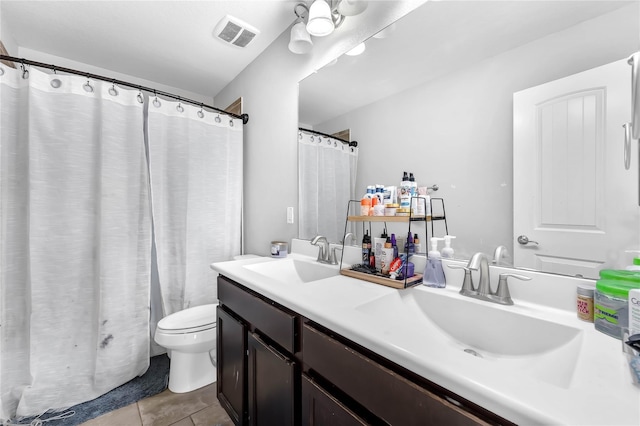 21275 Lily Springs Dr, Porter, TX 77365 - bathroom featuring double vanity and tile patterned floors