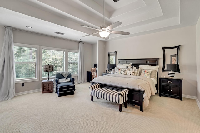 27326 S Karaugh Dr, Richmond, TX 77406 - bedroom with light carpet, baseboards, a tray ceiling, and a ceiling fan