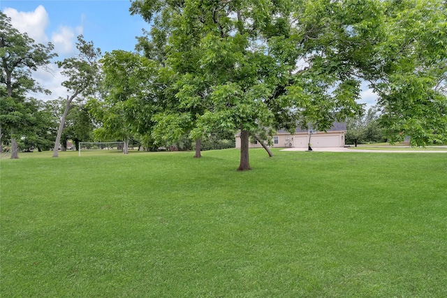 27326 S Karaugh Dr, Richmond, TX 77406 - view of yard with a garage