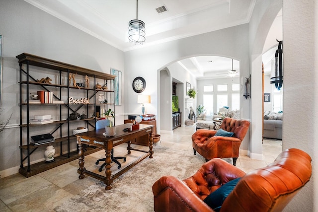 9811 Orchid Cove Ct, Cypress, TX 77433 - office area featuring arched walkways, a raised ceiling, ceiling fan, ornamental molding, and baseboards