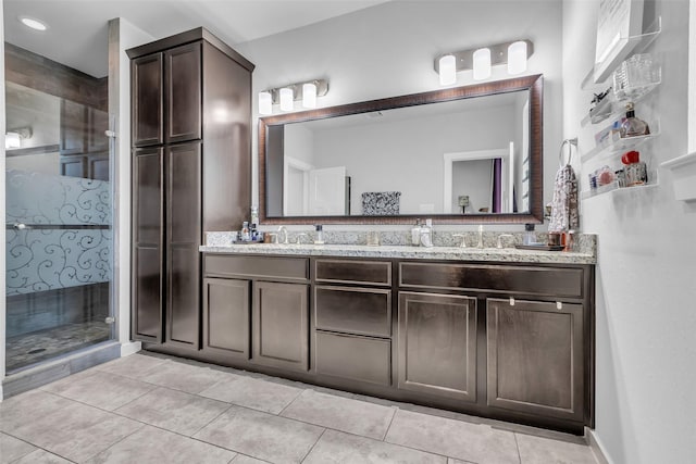 3009A Bell St, Houston, TX 77003 - bathroom featuring double vanity, a stall shower, and tile patterned floors