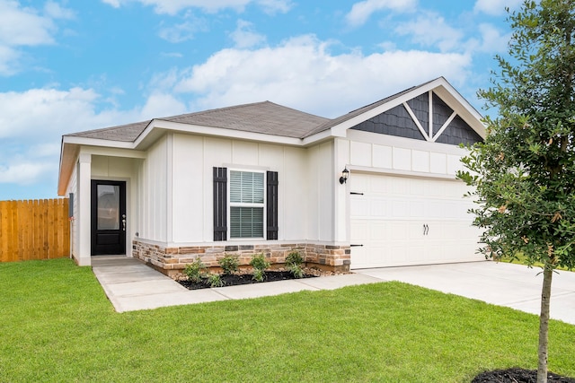 15846 Berry Hill Dr, Conroe, TX 77303 - view of front of home featuring driveway, an attached garage, stone siding, a shingled roof, and board and batten siding