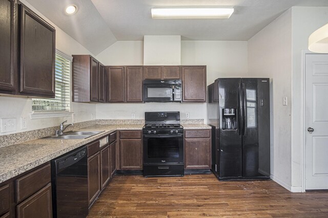 21606 Micheala Way, Humble, TX 77338 - kitchen featuring black appliances, a sink, dark brown cabinets, dark wood-style floors, and light countertops