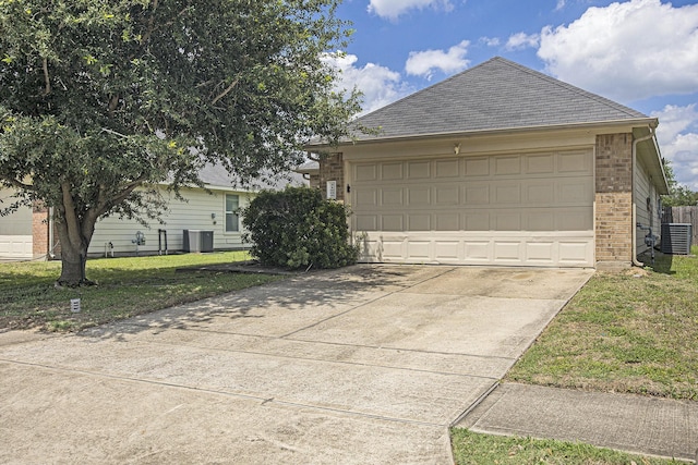 21606 Micheala Way, Humble, TX 77338 - garage with central air condition unit and concrete driveway