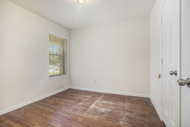 21606 Micheala Way, Humble, TX 77338 - spare room featuring dark wood finished floors and baseboards