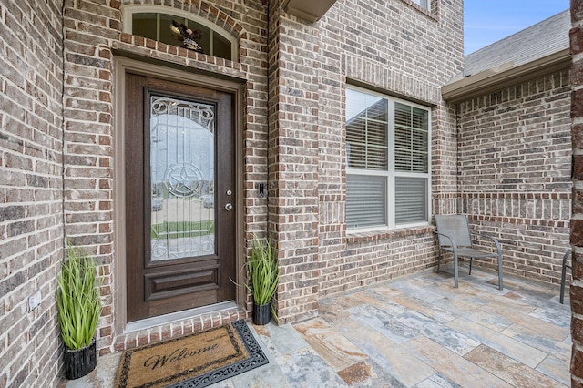 9407 Mineral Rock Ln, Richmond, TX 77407 - property entrance with brick siding