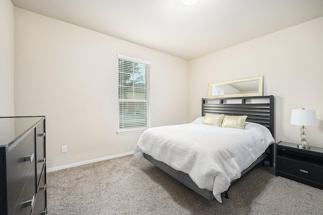 9407 Mineral Rock Ln, Richmond, TX 77407 - carpeted bedroom featuring baseboards