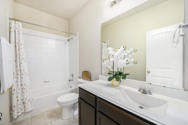 9407 Mineral Rock Ln, Richmond, TX 77407 - bathroom featuring vanity, shower / tub combo with curtain, toilet, and tile patterned floors
