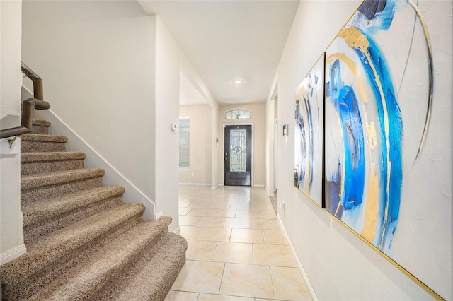 9407 Mineral Rock Ln, Richmond, TX 77407 - entryway featuring stairs, light tile patterned flooring, baseboards, and recessed lighting