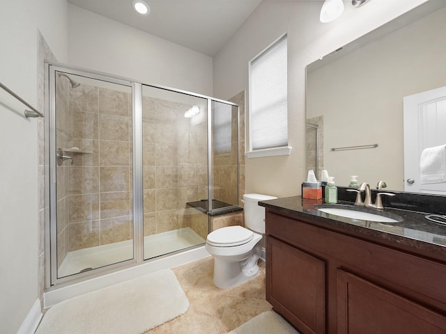 4202 Lodge Ranch Ct, Fulshear, TX 77441 - bathroom featuring toilet, vanity, a shower stall, and tile patterned flooring