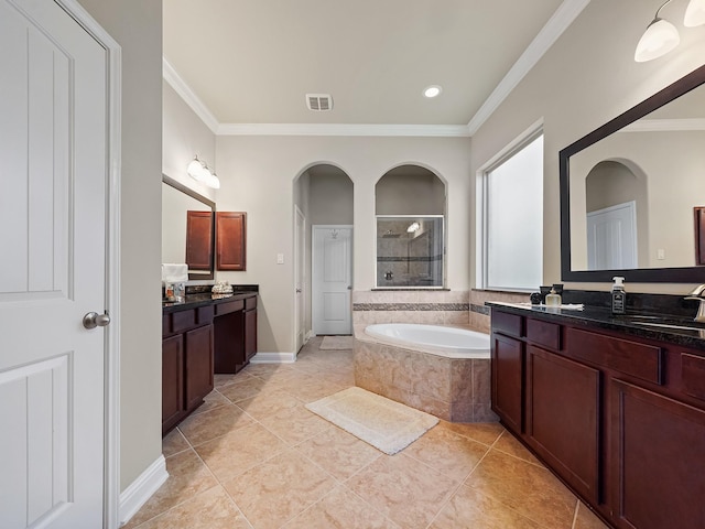 4202 Lodge Ranch Ct, Fulshear, TX 77441 - bathroom featuring ornamental molding, a garden tub, tiled shower, two vanities, and tile patterned floors