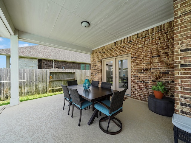 4202 Lodge Ranch Ct, Fulshear, TX 77441 - view of patio / terrace featuring french doors and outdoor dining area