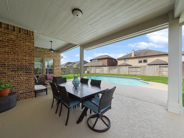 4202 Lodge Ranch Ct, Fulshear, TX 77441 - view of patio / terrace with a ceiling fan, outdoor dining area, and a residential view