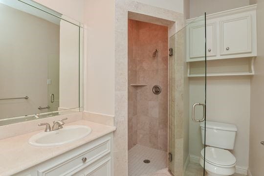5422 Gibson St Unit A, Houston, TX 77007 - full bath featuring vanity, toilet, and a stall shower