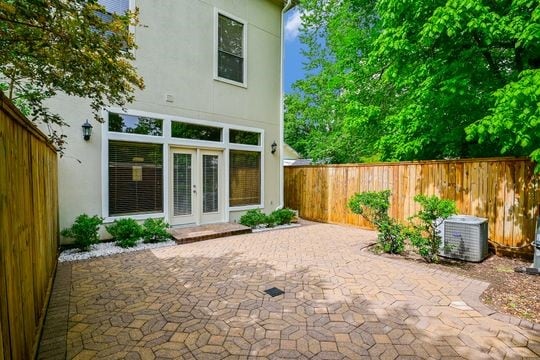 5422 Gibson St Unit A, Houston, TX 77007 - view of patio with french doors and central AC