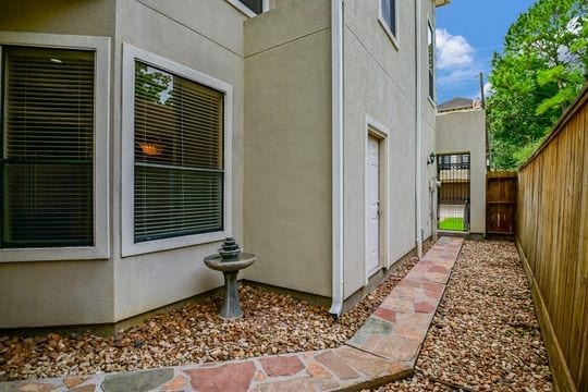 5422 Gibson St Unit A, Houston, TX 77007 - view of home's exterior featuring stucco siding