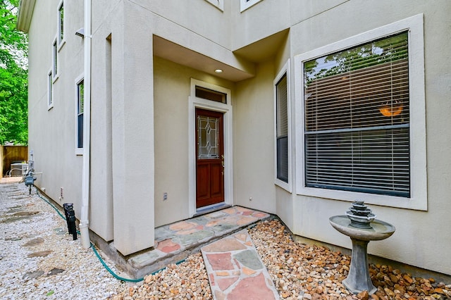 5422 Gibson St Unit A, Houston, TX 77007 - doorway to property featuring stucco siding