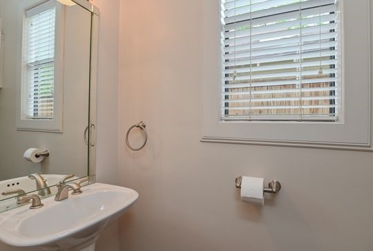 5422 Gibson St Unit A, Houston, TX 77007 - bathroom featuring a sink and plenty of natural light