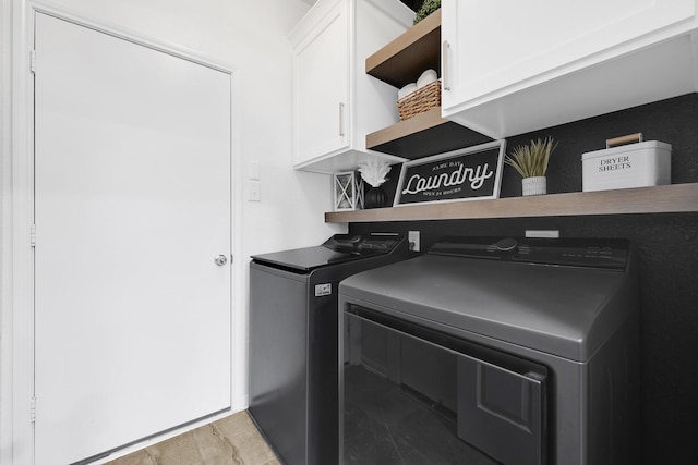 14806 Meadow Acre Trl, Houston, TX 77049 - washroom featuring cabinet space and independent washer and dryer