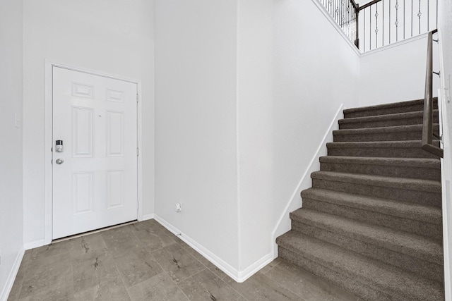 14806 Meadow Acre Trl, Houston, TX 77049 - entryway with baseboards and stairs