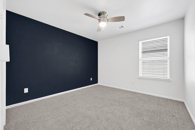 14806 Meadow Acre Trl, Houston, TX 77049 - empty room featuring a ceiling fan, carpet, and baseboards