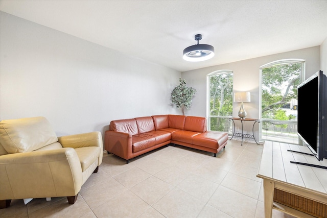 4631 Wild Indigo St Unit 571, Houston, TX 77027 - living room featuring light tile patterned floors