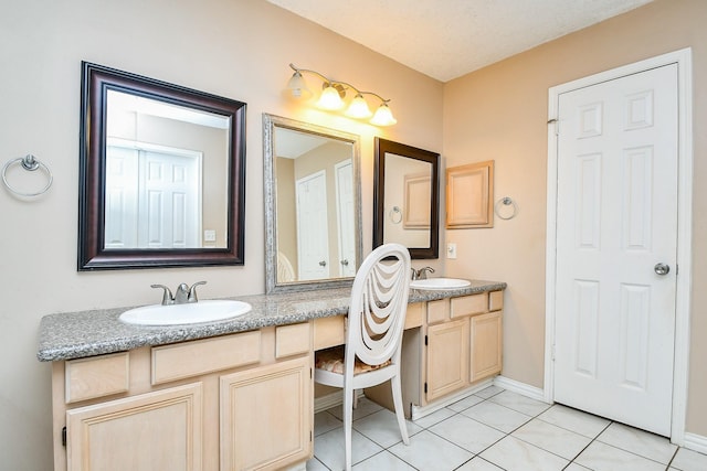 18178 Holly Green Dr, Houston, TX 77084 - bathroom featuring vanity, tile patterned floors, and baseboards