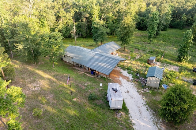 5332 County Road 1180, Kennard, TX 75847 - aerial view of property and surrounding area with a heavily wooded area
