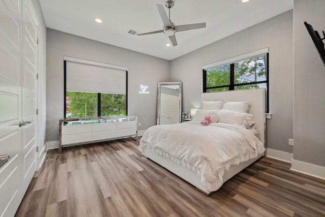 27457 S Lazy Meadow Way, Spring, TX 77386 - bedroom with baseboards, recessed lighting, wood finished floors, and a ceiling fan