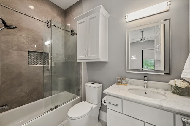 27457 S Lazy Meadow Way, Spring, TX 77386 - full bath with a ceiling fan, enclosed tub / shower combo, vanity, and toilet