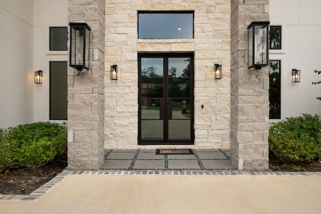 27457 S Lazy Meadow Way, Spring, TX 77386 - property entrance featuring french doors and stone siding