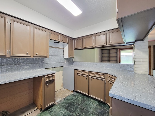 1703 Raintree St, Baytown, TX 77520 - kitchen with backsplash and light countertops