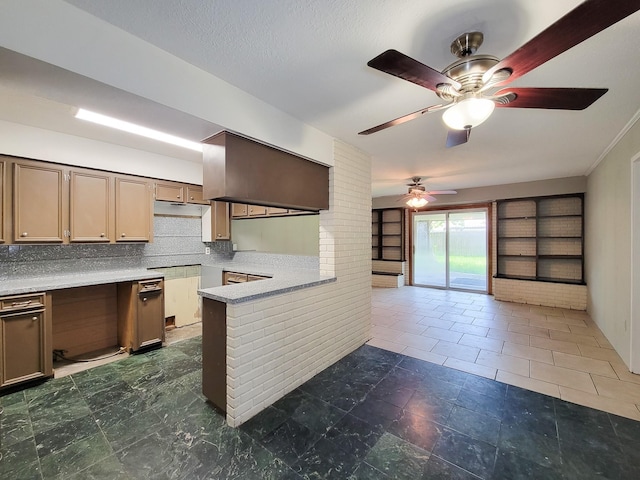 1703 Raintree St, Baytown, TX 77520 - kitchen featuring backsplash, a ceiling fan, light countertops, and a peninsula