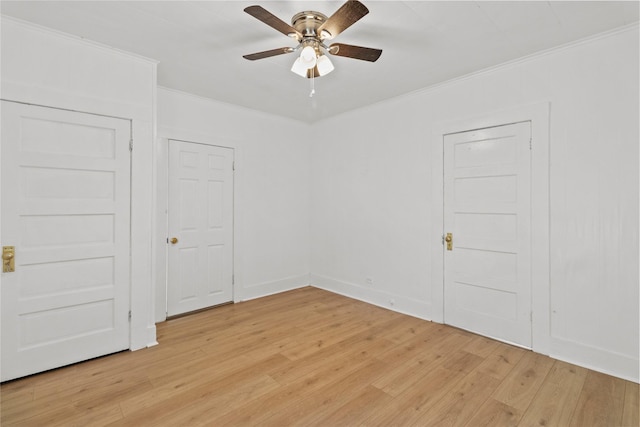 706 E Hunnicutt St, Baytown, TX 77520 - spare room with crown molding, ceiling fan, and light wood-style floors