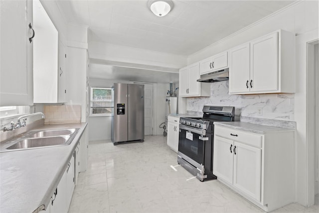 706 E Hunnicutt St, Baytown, TX 77520 - kitchen featuring appliances with stainless steel finishes, under cabinet range hood, a sink, white cabinets, and backsplash