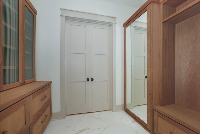 1253 Lamonte Ln, Houston, TX 77018 - mudroom featuring light marble finish flooring