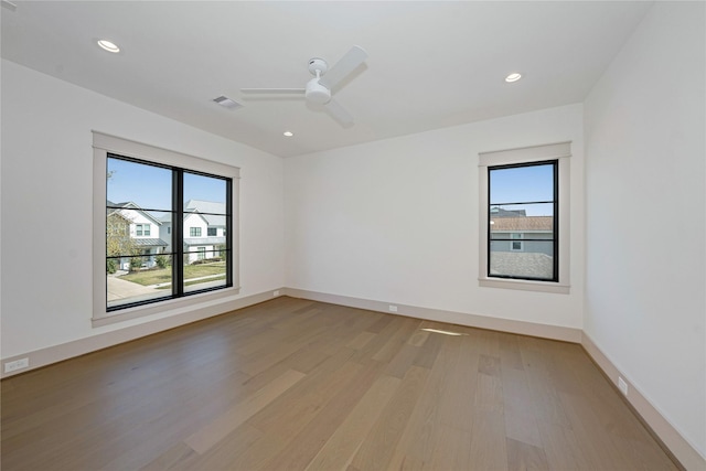 1253 Lamonte Ln, Houston, TX 77018 - unfurnished room featuring light wood-style floors, ceiling fan, recessed lighting, and baseboards