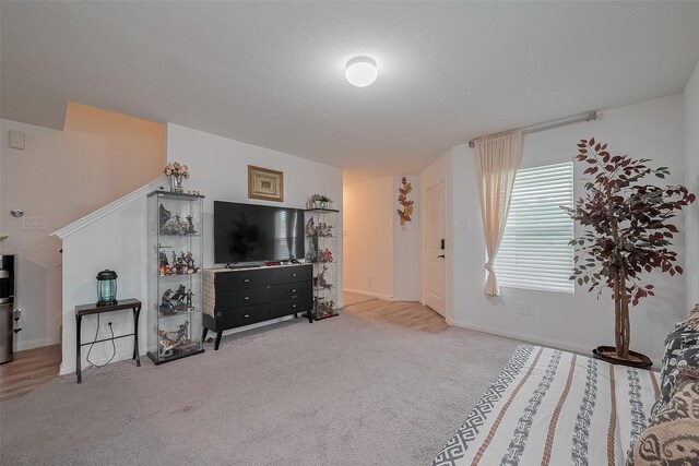 862 Rd 5138, Cleveland, TX 77327 - living room with carpet flooring, baseboards, and stairs