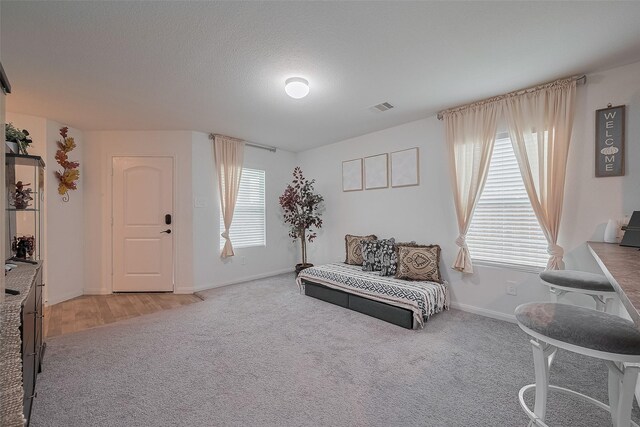 862 Rd 5138, Cleveland, TX 77327 - sitting room with light carpet and baseboards