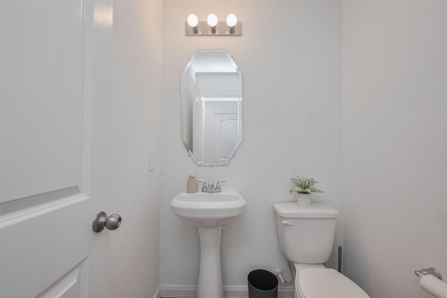 862 Rd 5138, Cleveland, TX 77327 - bathroom with toilet and a sink