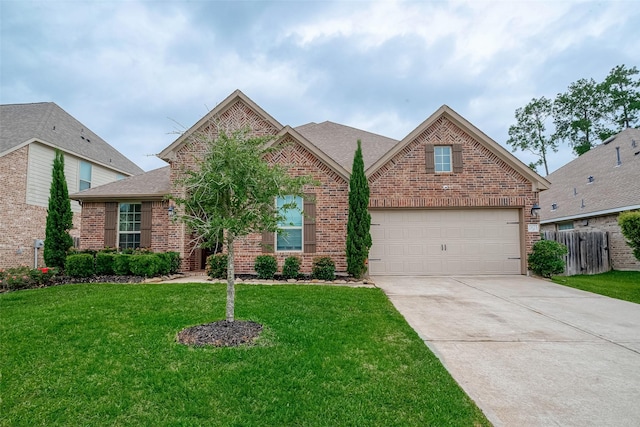 2625 Blooming Field Ln, Conroe, TX 77385 - traditional-style home featuring brick siding, driveway, a shingled roof, and an attached garage