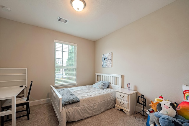 2625 Blooming Field Ln, Conroe, TX 77385 - bedroom with light colored carpet and baseboards